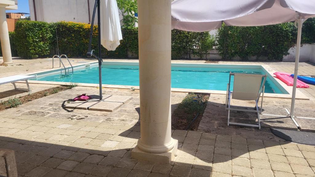 Piscina all'aperto e solarium Apartment Gaia
